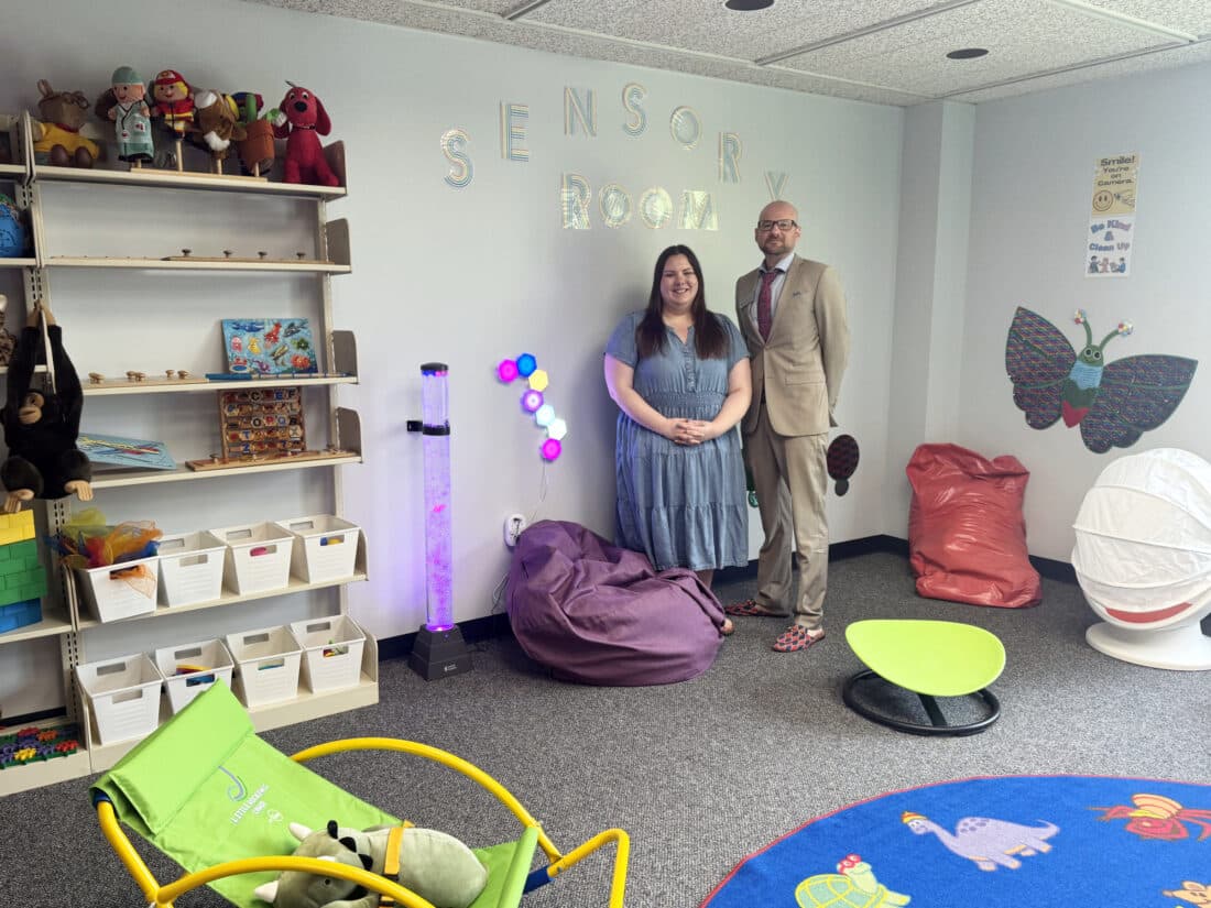 Ross Library youth services coordinator and executive director standing in the library's second-floor sensory room in Lock Haven, Pennsylvania